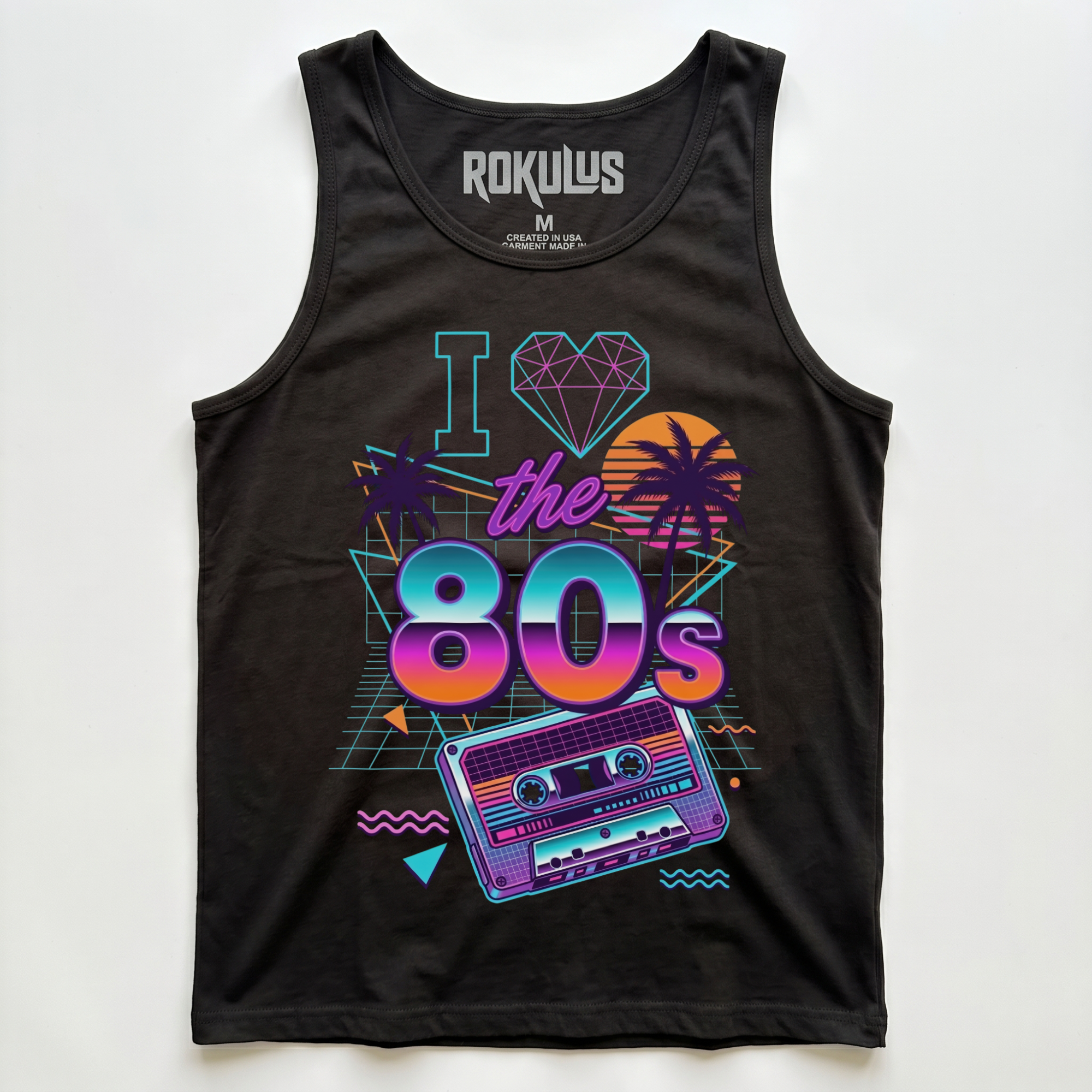 Black tank top laid flat on a white background, showing the I Love the 80s neon graphic with palm trees, sunset, and a cassette tape, plus the Rokulus inner-neck label