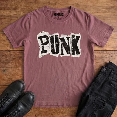 Washed maroon Rokulus Punk vintage graphic tee laid flat on wood with black boots and jeans, front print showing the word “Punk” in bold cut-and-paste ransom-note letters on torn distressed paper